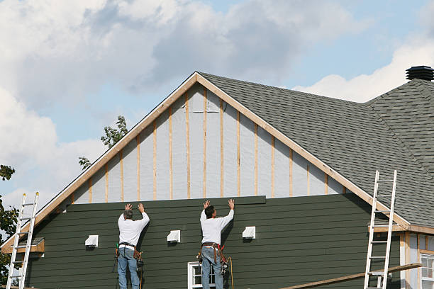 Professional Siding technician working in Flower Mound, TX